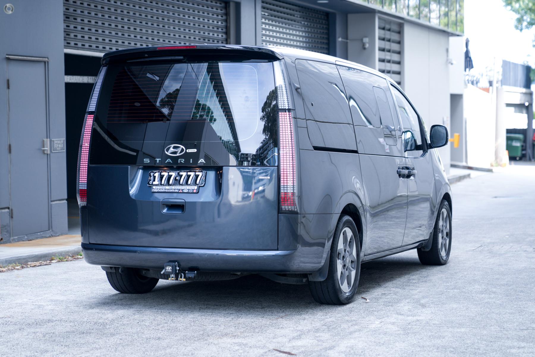 
								2021 Hyundai STARIA US4.V1 MY22 Highlander Wagon 8st 5dr Spts Auto 8sp AWD full									