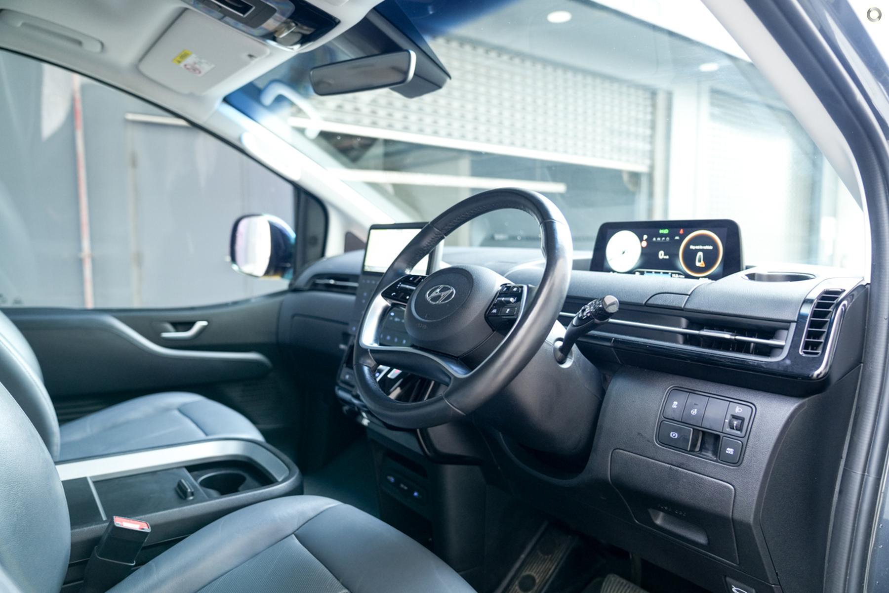 
								2021 Hyundai STARIA US4.V1 MY22 Highlander Wagon 8st 5dr Spts Auto 8sp AWD full									